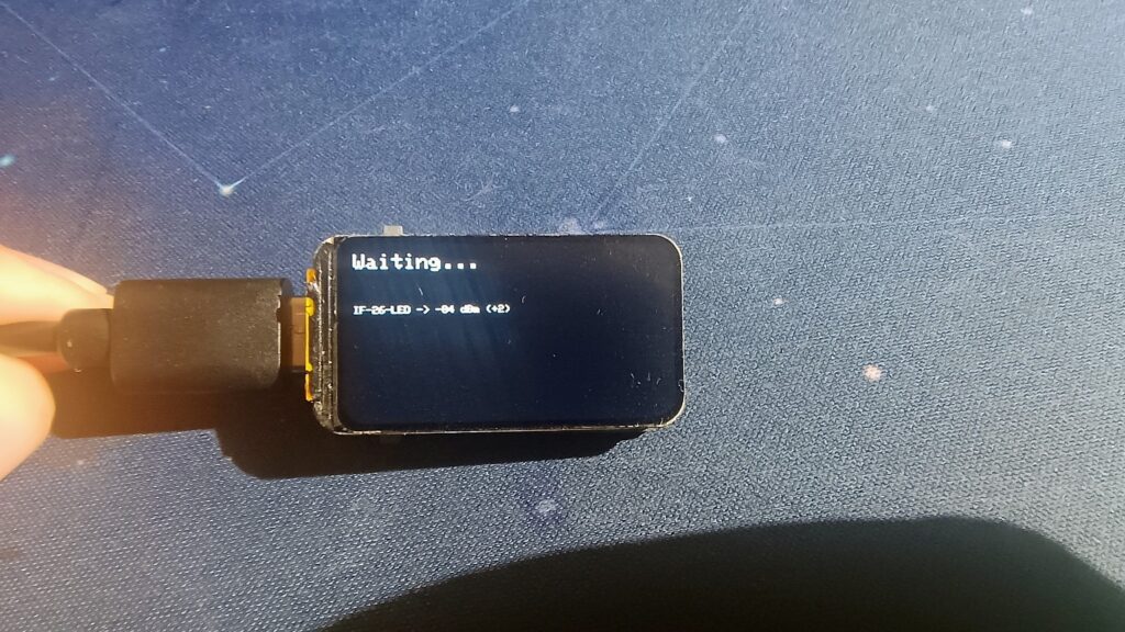 ESP32 with embedded display showing detection screen in automatic BLE barrier detection system
